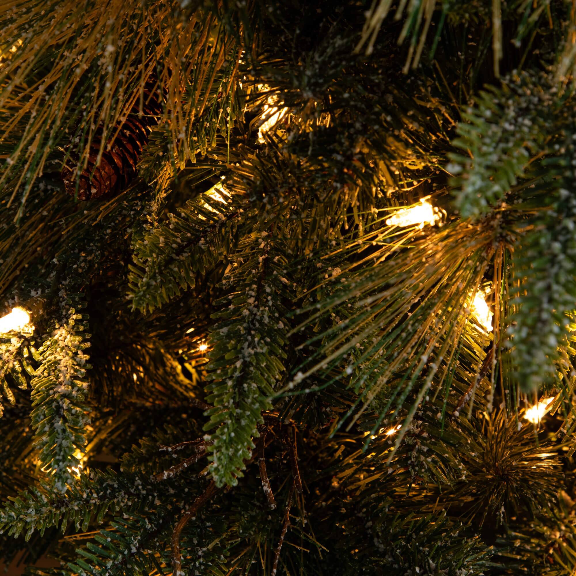 4ft. Pre-Lit Mixed Pine Snowed Artificial Christmas Tree with Pinecones in Decorative Planter, Warm White LED Lights